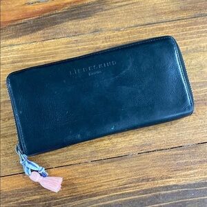 Liebeskind leather wallet full zipper closure tassel pull neutral black minimal